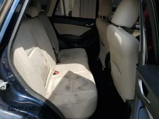 2016 Mazda CX-5 Sport z VIN JM3KE4BY8G0837052, wystawiony jako Copart lot #54700235 z przebiegiem 124 172 mil mil oraz Szkoda całkowita • Salvage title. Historia ofert i sprzedaży dostępna na DreamBid. Obrazek 10.