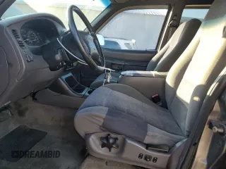 1999 Ford Explorer XL with VIN 1FMZU34X8XUC31019, listed as a Copart auction lot 87831635 with 220,683 mi miles and Salvage title. Bid and sale history available at DreamBid. Image 7.