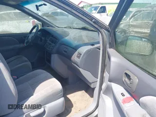 1998 Toyota Sienna LE z VIN 4T3ZF13CXWU053682, wystawiony jako IAAI lot #42029382 z przebiegiem 237 471 mil mil oraz . Historia ofert i sprzedaży dostępna na DreamBid. Obrazek 5.