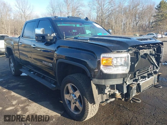2017 GMC Sierra 2500HD SLT with VIN 1GT12TEY1HF213286, listed as a IAAI auction lot 41696875 with 55,047 mi miles. Bid and sale history available at carsss.com. Image 1.
