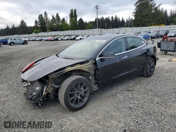 2019 Tesla Model 3 Mid Range z VIN 5YJ3E1EA2KF361787, wystawiony jako Copart lot #56059465 z przebiegiem 50 186 mil mil oraz Szkody całkowita. Historia ofert i sprzedaży dostępna na DreamBid. Obrazek 1.