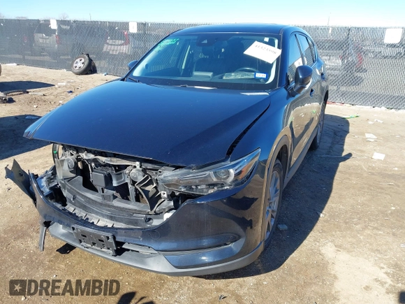 2019 Mazda CX-5 Grand Touring with VIN JM3KFBDM2K1685168, listed as a IAAI auction lot 41323598 with 88,429 mi miles. Bid and sale history available at carsss.com. Image 17.