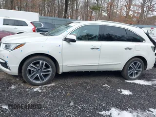 2019 Acura MDX Sport Hybrid w/Advance Pkg with VIN 5J8YD7H77KL000596, listed as a IAAI auction lot 41540974 with 89,378 mi miles. Bid and sale history available at carsss.com. Image 14.