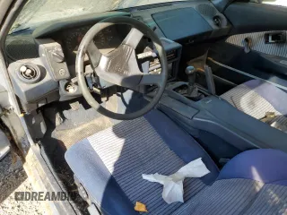 1989 Toyota MR2 z VIN JT2AW15C0K0146356, wystawiony jako Copart lot #76256644 z przebiegiem 294 380 mil mil oraz Tytuł czysty. Historia ofert i sprzedaży dostępna na DreamBid. Obrazek 8.
