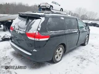 2011 Toyota Sienna LE AAS with VIN 5TDKK3DC3BS113594, listed as a IAAI auction lot 41236977 with 166,156 mi miles. Bid and sale history available at carsss.com. Image 4.