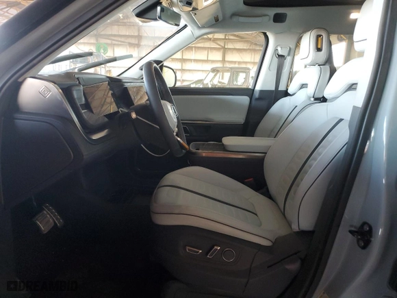 2022 Rivian R1T Adventure Package with VIN 7FCTGAAA3NN014291, listed as a Copart auction lot 76587044 with 0 mi miles and Salvage Title. Bid and sale history available at carsss.com. Image 7.