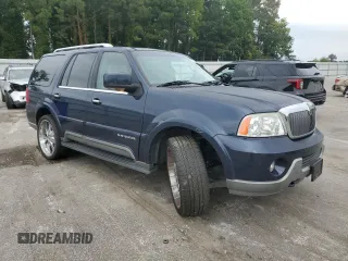 2004 Lincoln Navigator Luxury with VIN 5LMFU27R44LJ12389, listed as a Copart auction lot 73941144 with 184,642 mi miles and Salvage Title. Bid and sale history available at carsss.com. Image 4.