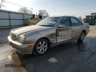 2002 Mercedes-Benz E-Class with VIN WDBJF65J22B490275, listed as a Copart auction lot 51128565 with 142,232 mi miles and Salvage Title. Bid and sale history available at carsss.com. Image 1.