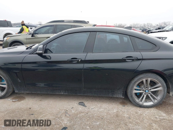 2015 BMW 4 Series 428i with VIN WBA4A9C54FD416870, listed as a IAAI auction lot 41593977 with 99,314 mi miles and . Bid and sale history available at DreamBid. Image 14.