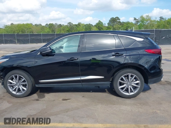 2020 Acura RDX w/Technology Pkg with VIN 5J8TC1H57LL002097, listed as a IAAI auction lot 41957752 with 60,945 mi miles. Bid and sale history available at carsss.com. Image 14.