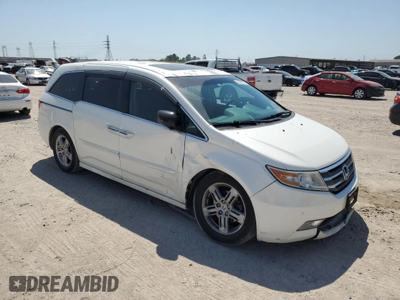 2013 Honda Odyssey Touring with VIN 5FNRL5H94DB021388, listed as a Copart auction lot 52582775 with 141,566 mi miles and Salvage Title. Bid and sale history available at carsss.com. Image 4.