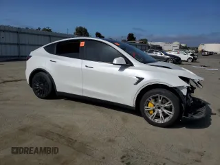 2021 Tesla Model Y Standard Range z VIN 5YJYGDED9MF110473, wystawiony jako Copart lot #53850085 z przebiegiem 46 242 mil mil oraz Szkoda całkowita • Salvage title. Historia ofert i sprzedaży dostępna na DreamBid. Obrazek 4.