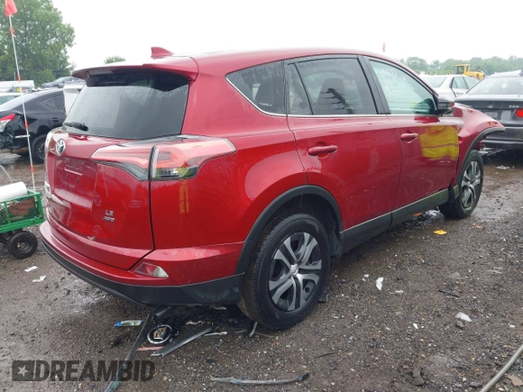 2018 Toyota RAV4 LE with VIN 2T3BFREV4JW850078, listed as a IAAI auction lot 42360903 with 81,591 mi miles and . Bid and sale history available at DreamBid. Image 4.