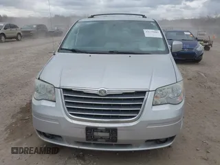 2010 Chrysler Town & Country Touring with VIN 2A4RR5D1XAR195748, listed as a IAAI auction lot 42029882 with 136,905 mi miles. Bid and sale history available at carsss.com. Image 12.