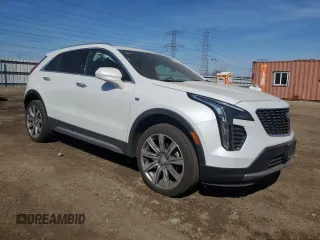 2019 Cadillac XT4 AWD Premium Luxury with VIN 1GYFZDR42KF182713, listed as a Copart auction lot 48633265 with 60,836 mi miles and Salvage title. Bid and sale history available at DreamBid. Image 4.