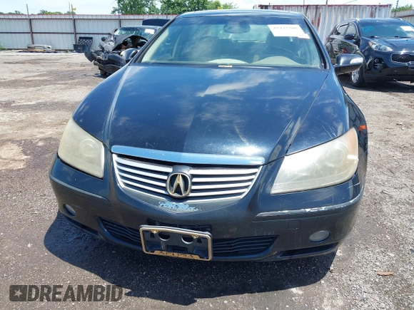 2005 Acura RL z VIN JH4KB16505C001925, wystawiony jako IAAI lot #42435200 z przebiegiem 154 217 mil mil oraz . Historia ofert i sprzedaży dostępna na DreamBid. Obrazek 12.