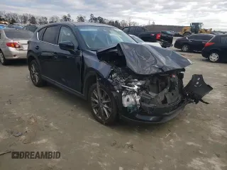 2020 Mazda CX-5 Grand Touring with VIN JM3KFADM4L1783968, listed as a Copart auction lot 85994244 with 89,074 mi miles and Salvage Title. Bid and sale history available at DreamBid. Image 14.