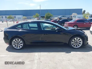 2019 Tesla Model 3 Long Range with VIN 5YJ3E1EB6KF192477, listed as a IAAI auction lot 41981600 with 62,888 mi miles. Bid and sale history available at carsss.com. Image 13.