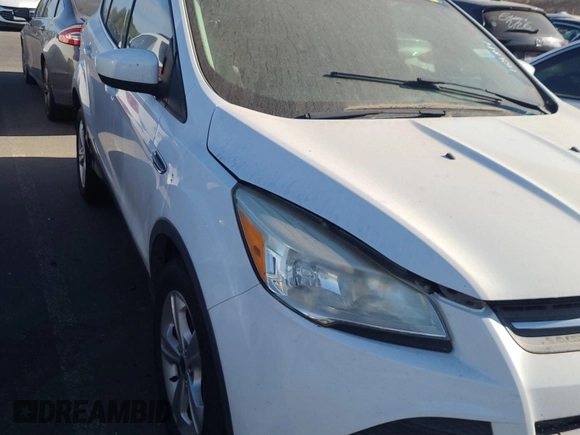 2013 Ford Escape SE z VIN 1FMCU9GX2DUB46936, wystawiony jako IAAI lot #42792269 z przebiegiem 196 885 mil mil oraz . Historia ofert i sprzedaży dostępna na DreamBid. Obrazek 1.