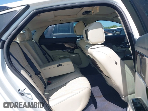 2012 Jaguar XJ XJL with VIN SAJWA2GB3CLV38500, listed as a IAAI auction lot 41990409 with 73,793 mi miles and . Bid and sale history available at DreamBid. Image 8.