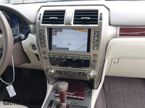 2014 Lexus GX with VIN JTJBM7FX0E5069997, listed as a IAAI auction lot 42076860 with 122,800 mi miles. Bid and sale history available at carsss.com. Image 21.