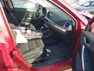 2016 Mazda CX-5 Touring with VIN JM3KE4CY0G0901356, listed as a IAAI auction lot 41641742 with 96,950 mi miles. Bid and sale history available at carsss.com. Image 5.