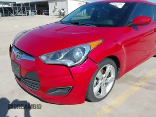 2013 Hyundai Veloster w/Gray Int z VIN KMHTC6AD0DU118150, wystawiony jako IAAI lot #41796309 z przebiegiem 249 384 mil mil oraz . Historia ofert i sprzedaży dostępna na DreamBid. Obrazek 17.