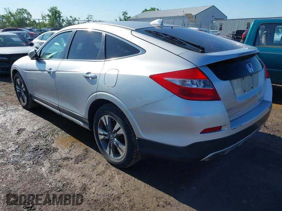 2013 Honda Crosstour EX-L z VIN 5J6TF2H56DL002499, wystawiony jako IAAI lot #42349382 z przebiegiem 174 542 mil mil oraz . Historia ofert i sprzedaży dostępna na DreamBid. Obrazek 3.
