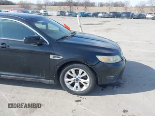 2011 Ford Taurus SEL with VIN 1FAHP2EW7BG139615, listed as a IAAI auction lot 41954932 with 256,223 mi miles. Bid and sale history available at carsss.com. Image 14.