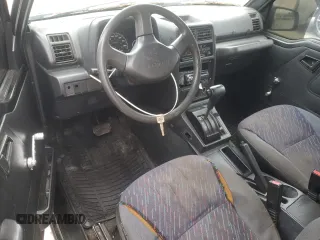 1994 Geo Tracker z VIN 2CNBE18U9R6936156, wystawiony jako Copart lot #45881915 z przebiegiem 201 227 mil mil oraz Szkody całkowita. Historia ofert i sprzedaży dostępna na DreamBid. Obrazek 8.