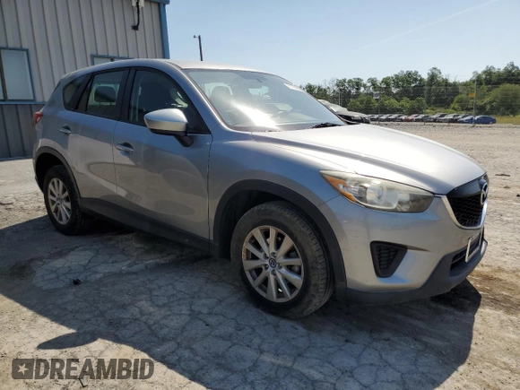 2014 Mazda CX-5 Sport with VIN JM3KE2BE7E0334880, listed as a Copart auction lot 61780635 with 96,926 mi miles and Salvage title. Bid and sale history available at DreamBid. Image 4.