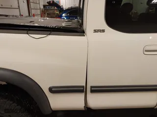 2002 Toyota Tundra SR5 with VIN 5TBBT44162S327523, listed as a IAAI auction lot 41635111 with 200,733 mi miles. Bid and sale history available at carsss.com. Image 22.