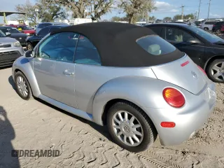2004 Volkswagen Beetle with VIN 3VWCM21Y34M300701, listed as a Copart auction lot 77567344 with 91,236 mi miles and Salvage Title. Bid and sale history available at DreamBid. Image 2.