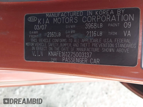 2007 Kia Spectra with VIN KNAFE161275003137, listed as a IAAI auction lot 41697530 with 256,834 mi miles. Bid and sale history available at carsss.com. Image 9.