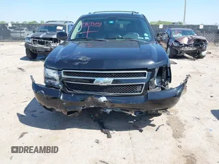 2013 Chevrolet Suburban LT with VIN 1GNSCJE0XDR255326, listed as a IAAI auction lot 41969643 with 176,494 mi miles. Bid and sale history available at carsss.com. Image 6.