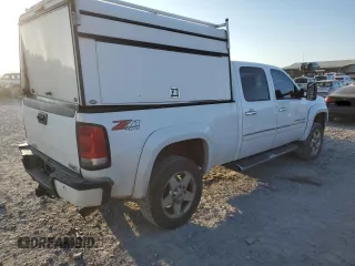 2011 GMC Sierra 2500HD Denali with VIN 1GT125CG4BF136605, listed as a Copart auction lot 83184234 with 221,476 mi miles and Salvage title. Bid and sale history available at DreamBid. Image 3.