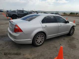 2012 Ford Fusion SEL with VIN 3FAHP0JG7CR257418, listed as a Copart auction lot 61842175 with 167,669 mi miles and Salvage title. Bid and sale history available at DreamBid. Image 3.