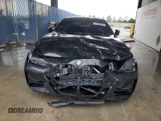 2022 BMW 4 Series 430i z VIN WBA53AP08NCJ06319, wystawiony jako Copart lot #73209604 z przebiegiem Nie podano mil oraz Szkoda całkowita • Salvage title. Historia ofert i sprzedaży dostępna na DreamBid. Obrazek 5.