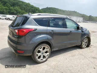2019 Ford Escape Titanium с VIN 1FMCU9J9XKUA39544, выставлен на аукционе Copart как лот 62363005 с пробегом 80 831 миль миль и Списание • Salvage title. История ставок и продаж доступна на DreamBid. Изображение 3.