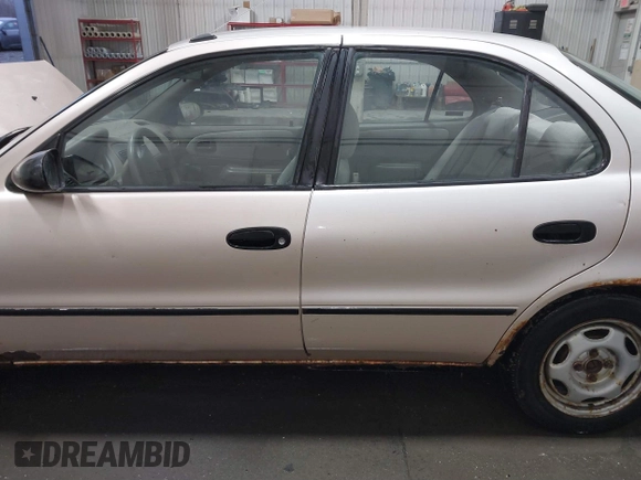 1997 Geo Prizm z VIN 1Y1SK526XVZ406366, wystawiony jako IAAI lot #41409191 z przebiegiem 259 489 mil mil oraz . Historia ofert i sprzedaży dostępna na DreamBid. Obrazek 14.