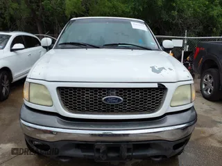 2002 Ford F-150 XLT with VIN 1FTRW08L02KE29411, listed as a IAAI auction lot 42133550 with 270,752 mi miles. Bid and sale history available at carsss.com. Image 6.