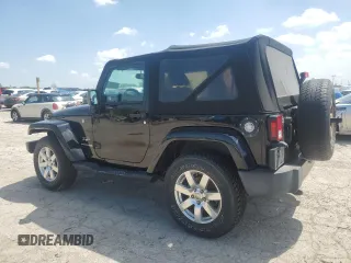 2018 Jeep Wrangler Sahara with VIN 1C4AJWBG5JL860734, listed as a Copart auction lot 57336175 with 115,080 mi miles and Clean title. Bid and sale history available at DreamBid. Image 2.