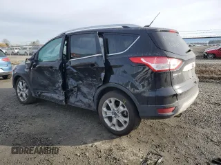 2016 Ford Escape Titanium with VIN 1FMCU0J9XGUA30359, listed as a Copart auction lot 89178985 with 148,718 mi miles and Salvage Title. Bid and sale history available at carsss.com. Image 2.