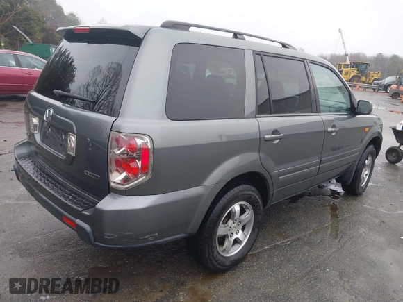 2007 Honda Pilot EX-L with VIN 5FNYF18677B033086, listed as a IAAI auction lot 41579680 with 280,246 mi miles and . Bid and sale history available at DreamBid. Image 4.