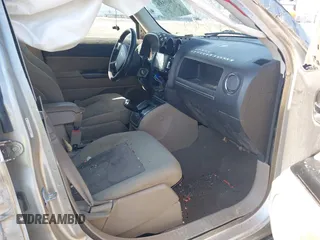 2010 Jeep Patriot Sport with VIN 1J4NF1GBXAD640562, listed as a IAAI auction lot 41869559 with 141,581 mi miles and . Bid and sale history available at DreamBid. Image 5.