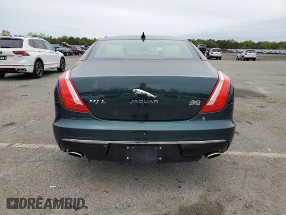 2018 Jaguar XJ Portfolio with VIN SAJWJ2GD9J8W15663, listed as a Copart auction lot 56734515 with 9,374 mi miles and Salvage Title. Bid and sale history available at DreamBid. Image 6.