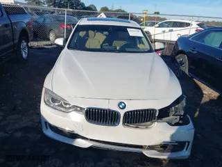 2015 BMW 3 Series 328i with VIN WBA3A5G53FNS87111, listed as a IAAI auction lot 40961587 with 122,767 mi miles. Bid and sale history available at carsss.com. Image 12.