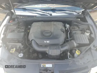 2015 Jeep Grand Cherokee Summit with VIN 1C4RJFJG6FC828922, listed as a Copart auction lot 54878415 with 125,781 mi miles and Salvage title. Bid and sale history available at DreamBid. Image 11.