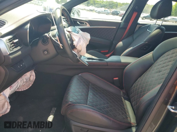 2023 Genesis G70 3.3T with VIN KMTG54TE3PU117672, listed as a Copart auction lot 63418684 with 19,899 mi miles and Salvage Title. Bid and sale history available at carsss.com. Image 7.