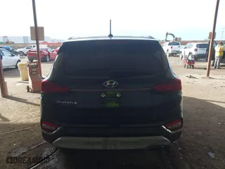2019 Hyundai Santa Fe SE with VIN 5NMS23AD1KH112931, listed as a IAAI auction lot 41678592 with 96,477 mi miles. Bid and sale history available at carsss.com. Image 16.